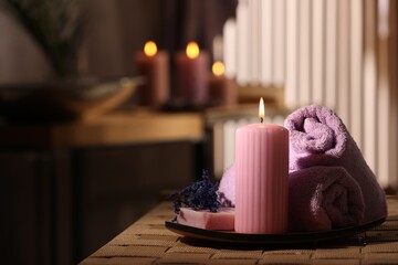 Beautiful composition with different spa products on wicker bench indoors, space for text