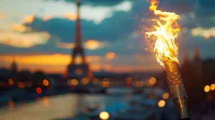 Store enrouleur Paris Flame from the Olympic Games in Paris with the Eiffel Tower in the background out of focus in high resolution and high quality