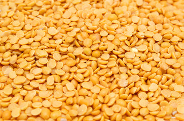 Split and hulled mung beans isolated on background