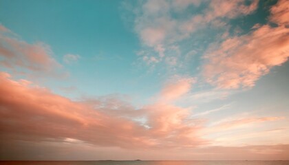 a nature background coral clouds over turquoise sky