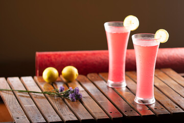 Chilled Red Cocktails with Lime Garnish