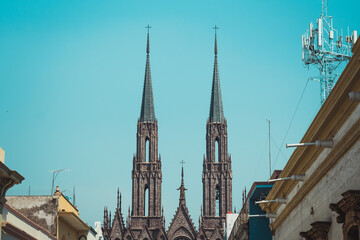 Exteriors during the afternoon of the Cathedral "Diocesan Sanctuary of Our Lady of Guadalupe" of Zamora Michoacan, shows Gothic style architecture.