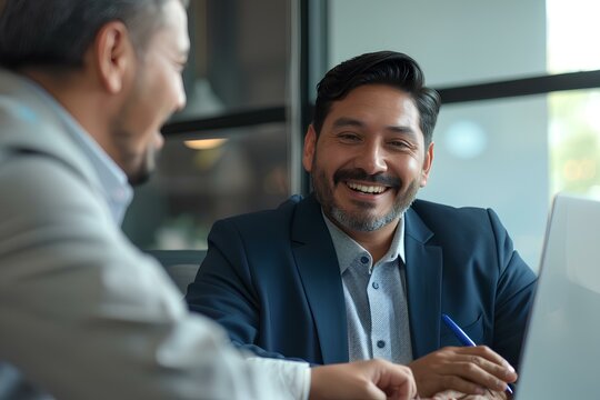 Portrait of smiling hispanic young businessman working with middle aged business man at office meeting, sitting in modern boardroom and discussing project using laptop computer. generative AI