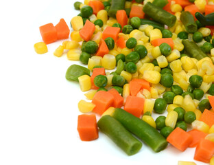 Fresh mixed vegetables on white. Golden mix.