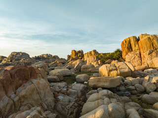 Fototapeta na wymiar Rocks in the middle corner of Qizi Bay, Changjiang, Hainan, China