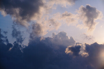 Naklejka na ściany i meble Beautiful clouds abstract during sunrise at the beach