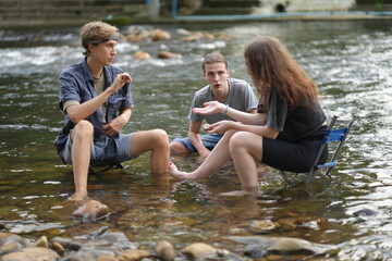 Fototapeta premium Group of Young man and woman enjoy and fun outdoor lifestyle travel nature forest mountain on summer holiday vacation. FRIENDS IN NATURE ENGAGED IN OUTDOOR ACTIVITIES.