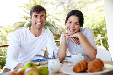 Couple, balcony and outdoor portrait for meal, love and affection in marriage or romance in nature....