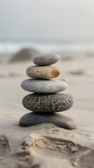 Fototapeta na wymiar Minimalist, abstract background, A collection of rocks piled on top of each other, situated on a sandy beach., balanced and stable, smooth sand