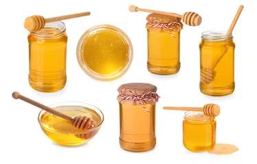  Natural honey, glass jars and dippers isolated on white, set © New Africa