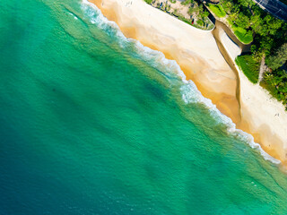 Summer sea waves crashing on sandy shore seascape background,Wide angle lens ocean nature background