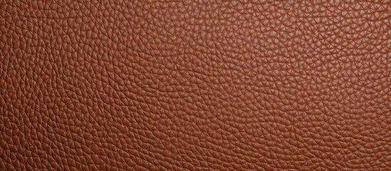 Detailed view of a rich textured brown leather with natural variations and patterns.