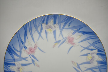 Vintage porcelain plate with floral pattern