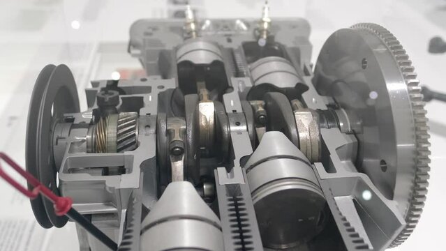 Air-cooled, four-cylinder, Boxer flat engine parts move, display Porsche museum, retro-style, automotive passion, history automotive industry show in Stuttgart, Germany - January 26, 2024