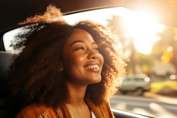 Joyful African American Woman Enjoying Sunlight in Car, Radiant Smile, Golden Hour Ambiance - obrazy, fototapety, plakaty