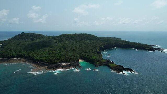 Ilheu das Rolas island, sunny day in Sao Tome and Principe, Africa - Aerial view
