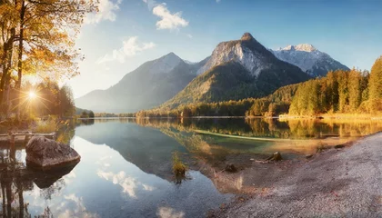 Fotobehang fantastic autumn panorama on hintersee lake colorful morning view of bavarian alps on the austrian border germany europe beauty of nature concept background © Kristopher