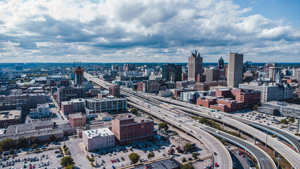Fototapeta na wymiar aerial view of freeway cutting through downtown