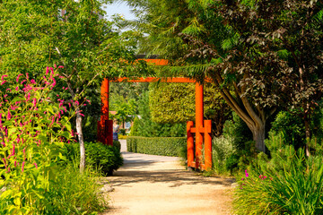 Japanese garden. Red Japanese wooden gate