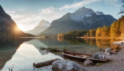 Zelfklevend Fotobehang fantastic autumn sunrise of hintersee lake amazing morning view of bavarian alps on the austrian border germany europe beauty of nature concept background © Ryan