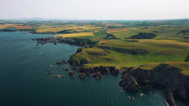 Aerial View of Britain's Coast: Scotland&rsquo;s Cliffs and Small Fishing Village of St Abbs. Scottish Landscape.