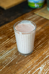 Delicious Pink Smoothie made from Milk and Yoghurt with foam on top