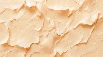 Foto op Canvas A detailed view of a soft peach beige cream colored surface, showcasing texture. Background. © keystoker