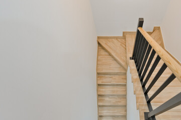 A bright maple-colored staircase that goes well with any home