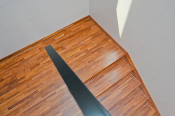 Brightly colored wooden colored stairs made from maple, which is always on trend