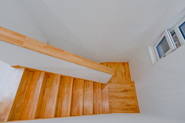 Naklejka na ściany i meble Maple-colored stairs that look great in any home
