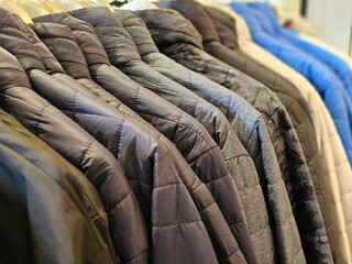 Fototapeta premium Assorted Clothing Items on Rack