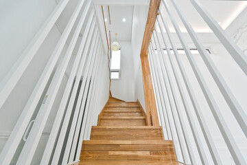 Stunning bright wooden colored stairs made from timeless maple wood