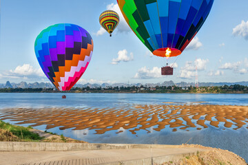 A colorful balloons festival is held along the Mekong River in Nakhon Phanom Province, Thailand.