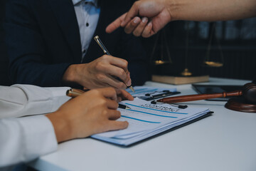 Businessman and Male lawyer or judge consult having team meeting with client, Law and Legal services concept.