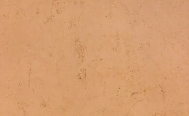 red clay wall background. yellow earth, ocher - close up