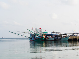 Fishing boat anchored against a clear sky. Sunny day. No people, outdoors. Concept of leisure and travel