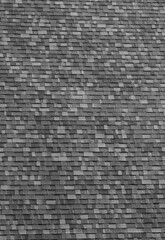 Silver, Grey, and Black Asphalt Shingles on an Arched Roof.