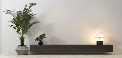 A contemporary TV cabinet with a matte black finish, showcasing a tall potted plant and a sleek lamp with geometric design, against a white wall background