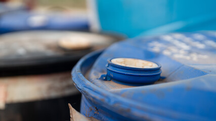 Close-up at chemical liquid drum or barrel bottle cap which is lock seal at the outlet hole....