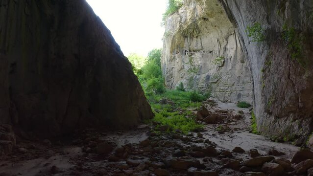 Flying Inside The Prohodna Cave In Karlukovo, Bulgaria. - aerial shot