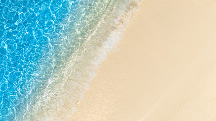 Aerial view of Beach sand background for summer vacation concept. Beach nature and summer seawater...