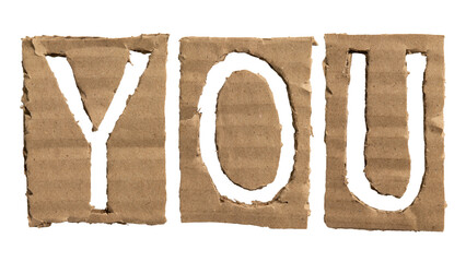 A word "you" crafted from a cardboard