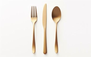 Golden cutlery set on a white background