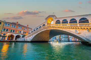 Panoramic view of famous Canal Grande with famous Rialto Bridge at sunset, Venice - 775567980