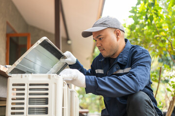 Air conditioner service outdoor checking fix repair. Air conditioner cleaning technician He opened...