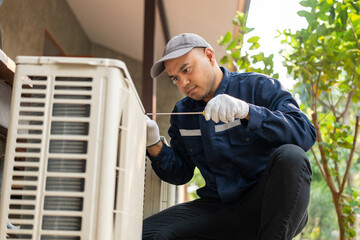 Air conditioner service outdoor checking fix repair. Air conditioner cleaning technician He opened...