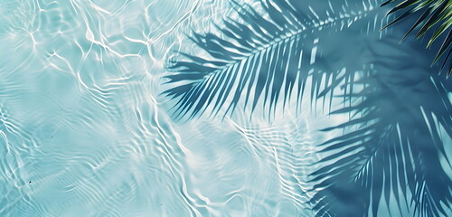 Tropical summer background with clear blue water and reflective shadows of palm trees. Top view of blue water. - obrazy, fototapety, plakaty