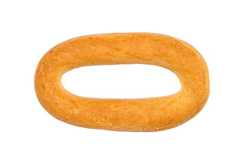 One oval bagel close-up. Bagel isolated on white background. Fresh sweet pastries.