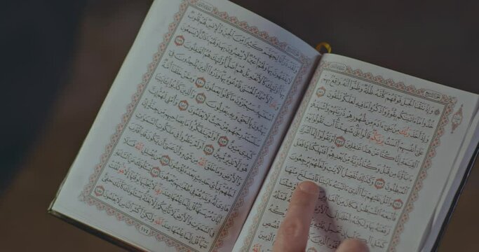 reading the (holy Qur'an) book