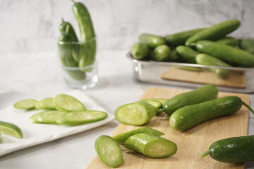 cut mini cucumber on a plate that's easy to eat